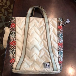 Cinda B vertical tote bag